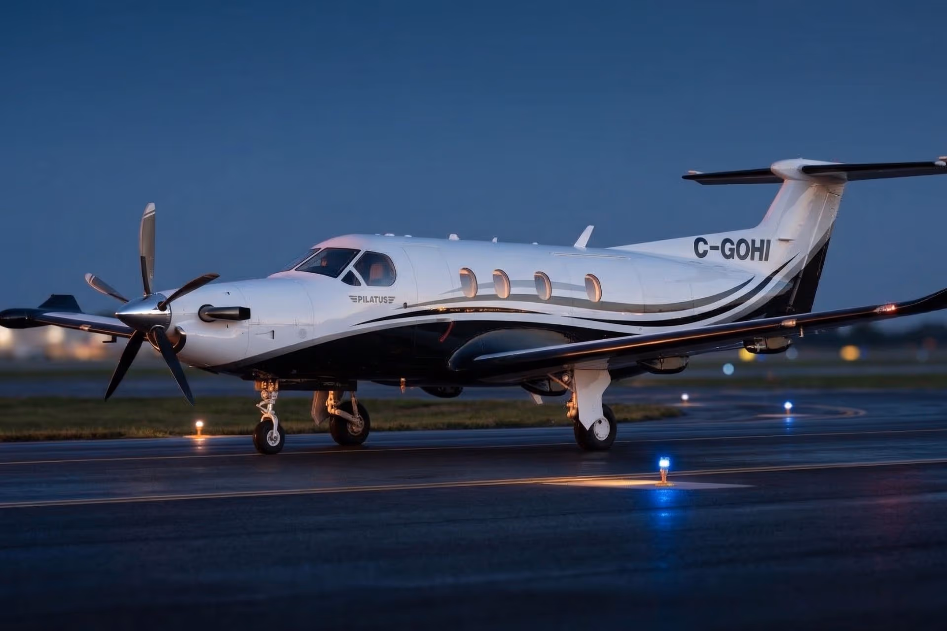 NectAir Pilatus PC-12 C-GOHI on the runway at dusk