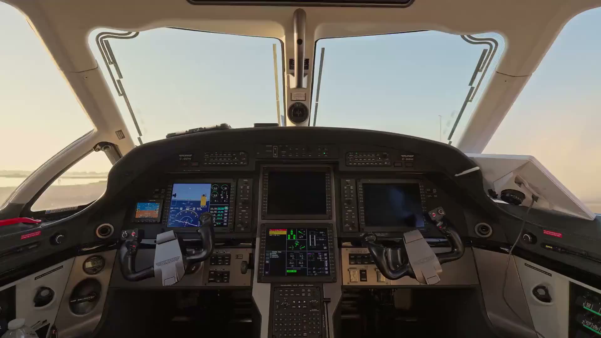 The flight deck of NectAir’s Pilatus PC-12, C-GOHI, in golden light